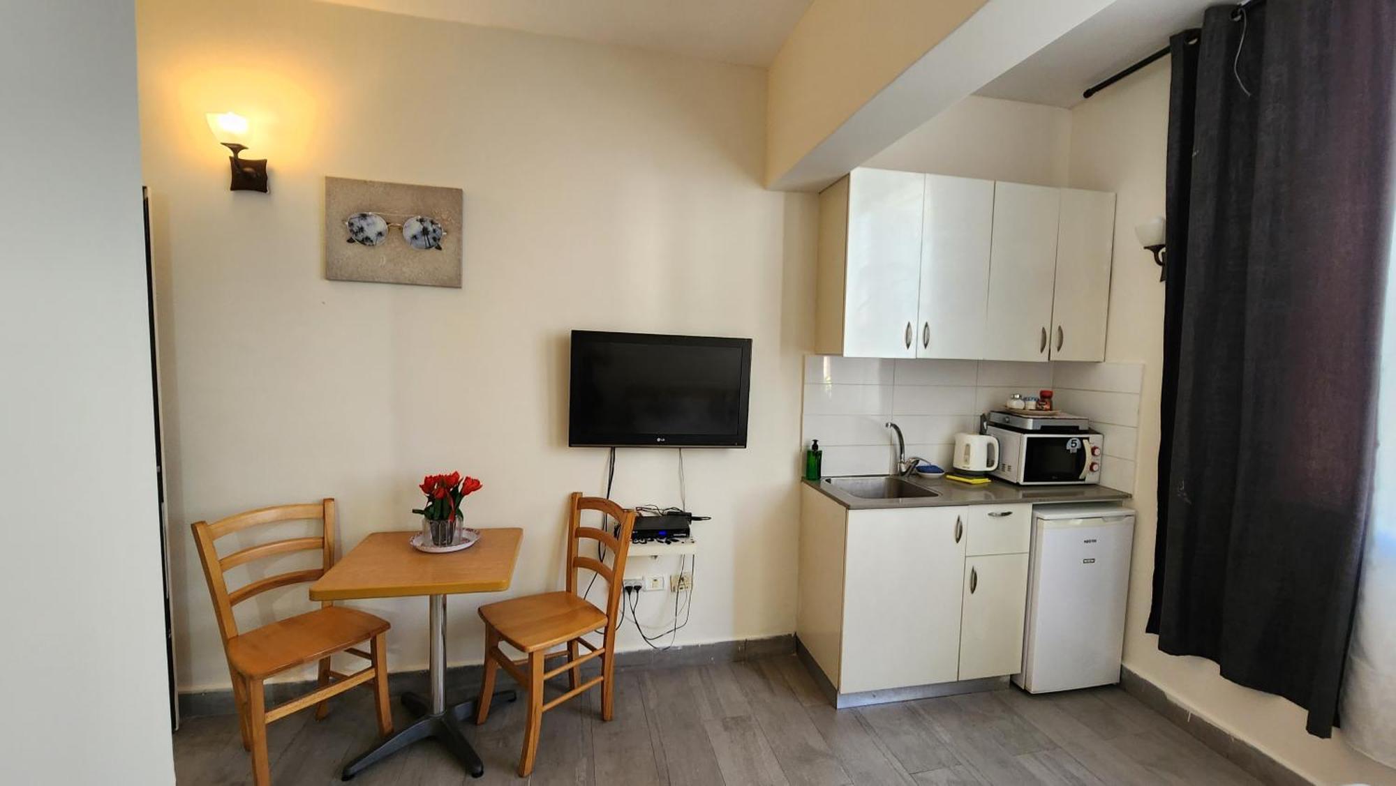 David Hameleh House Aparthotel Netánja Szoba fotó
