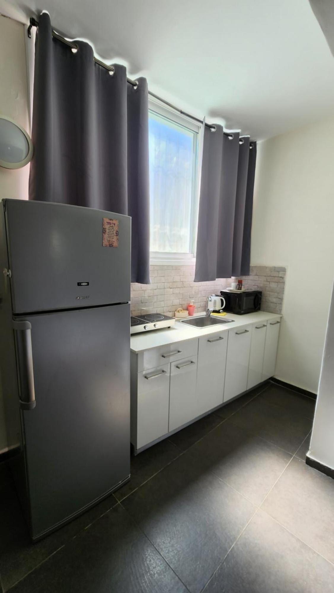 David Hameleh House Aparthotel Netánja Szoba fotó